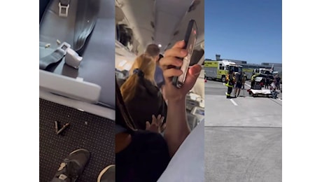 Portatile prende fuoco a bordo, panico su un volo della American Airlines, tre feriti: cosa è successo