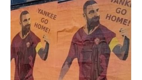 As Roma, la capitale tappezzata di manifesti: De Rossi nostro vanto, yankee go home!